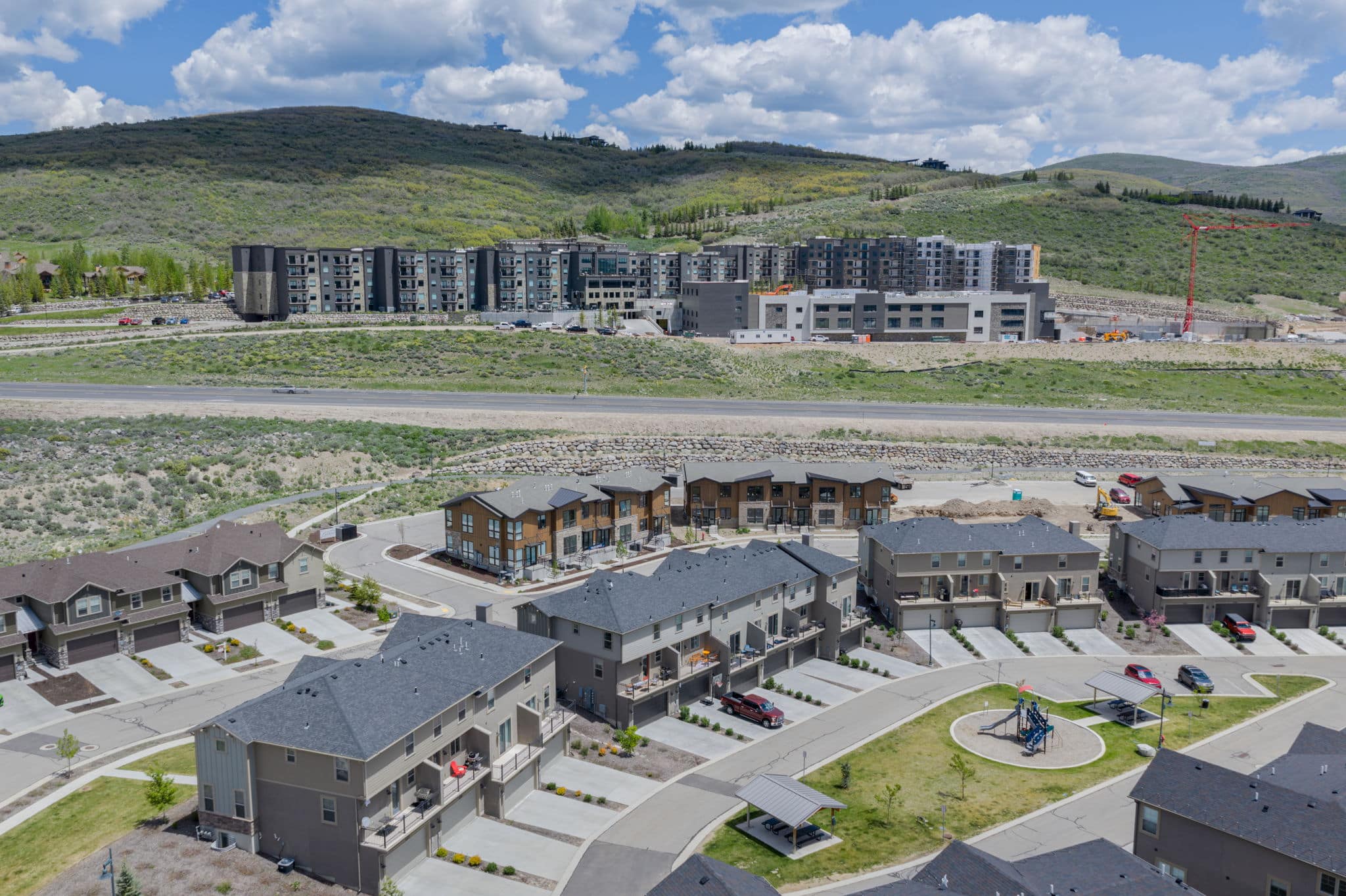 Aerial of Wasatch Springs townhomes near Park City with Black Rock Mountain Resort, Ice Arena and Event Center in the Background