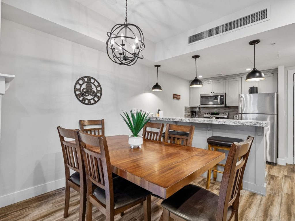 Kitchen and dining area inside Sundial Lodge condo at Canyons Village Park City