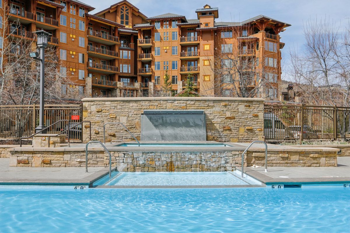 Heated outdoor pool and hot tubs at Hyatt Centric Park City with mountain views in Canyons Village Utah