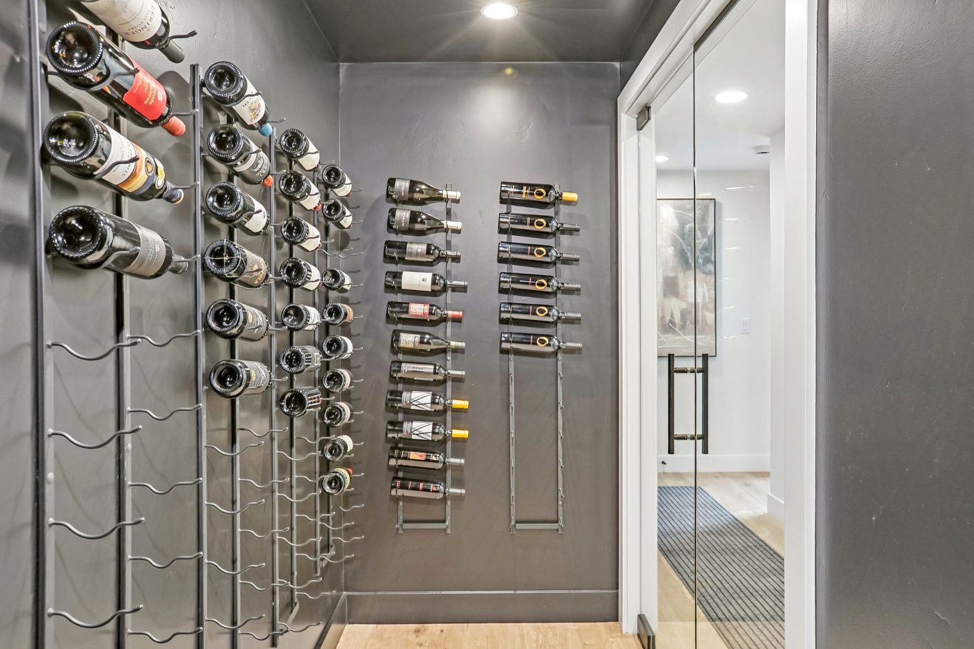 Custom wine storage room in a mountain contemporary home in Soaring Hawk at Hideout