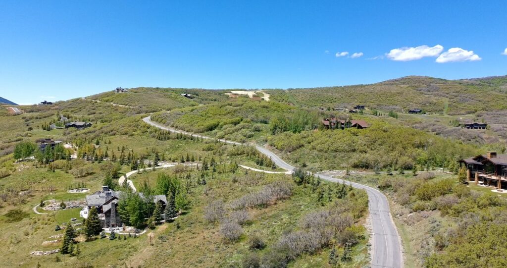 Aerial view of The Preserve showing luxury homes, expansive homesites, and open space near Park City Utah.