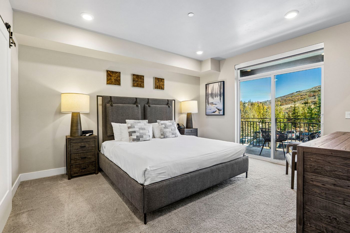 Furnished bedroom with a king-size bed in Black Rock Mountain Resort condominium #508 near Park City, Utah.