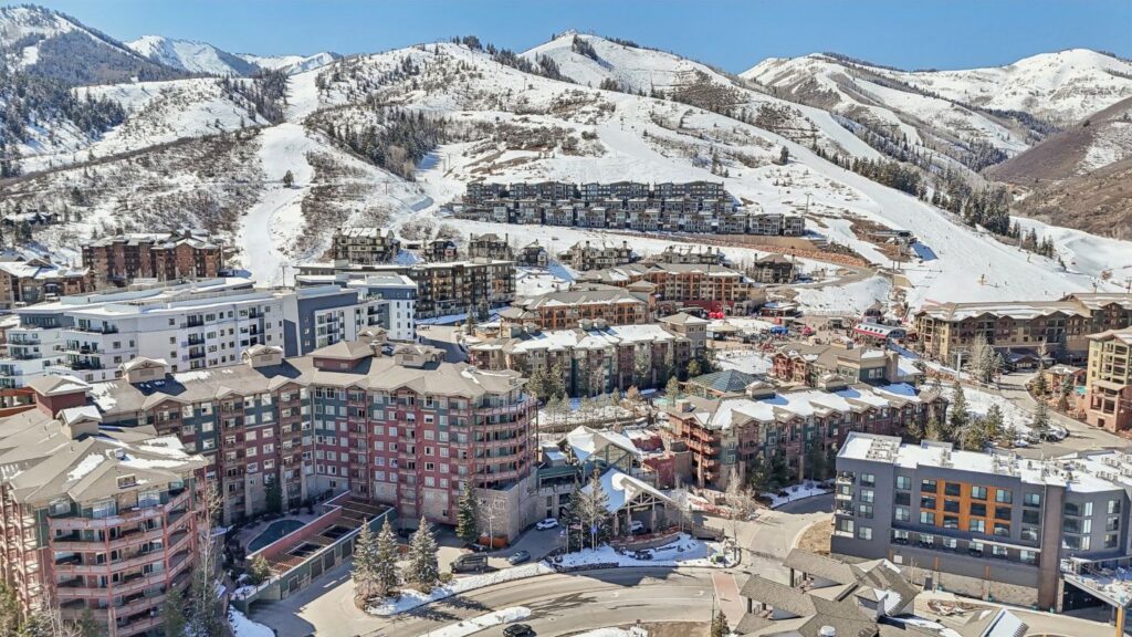 Aerial view of Westgate Park City in Canyons Village showing its proximity to the ski slopes and Red Pine Gondola.