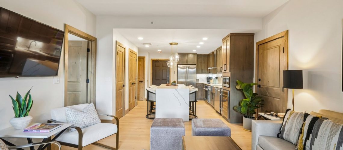 Furnished living area in Westgate Park City one-bedroom condo #3301A with gas fireplace and sleeper sofa.